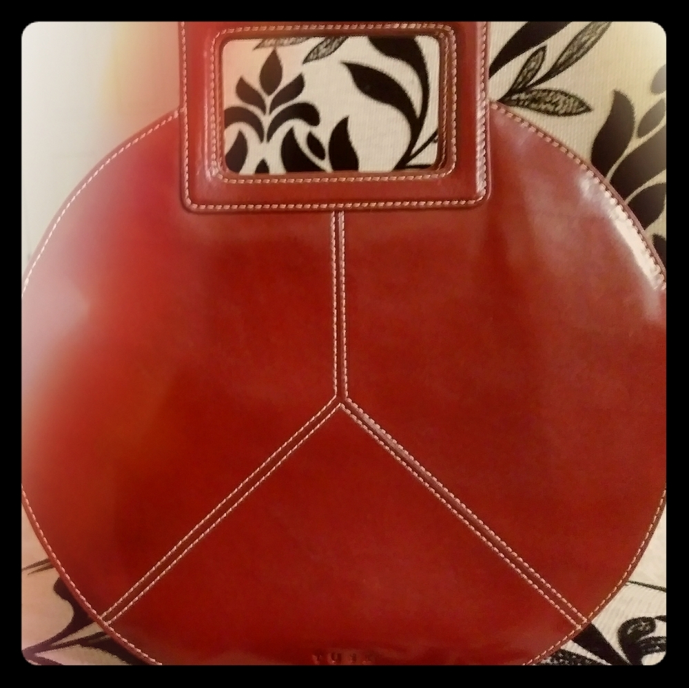 A leather Tusk handbag